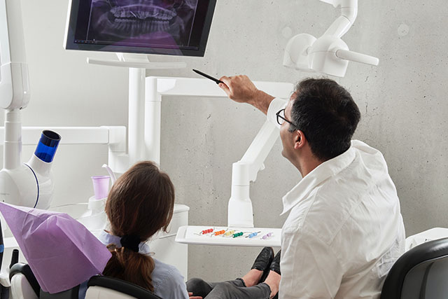 our dentist near riverbank ca walking a patient through x-rays