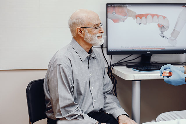 a patient seeking a dentist near riverbank ca for dental implants